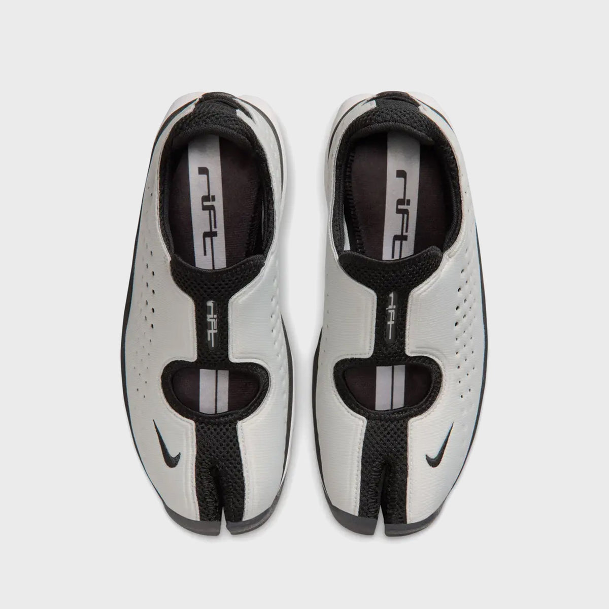 Nike Rift 2 split-toe sneakers in Black and Metallic Silver, top-down view showing the cloven toe and Rift branded tongue
