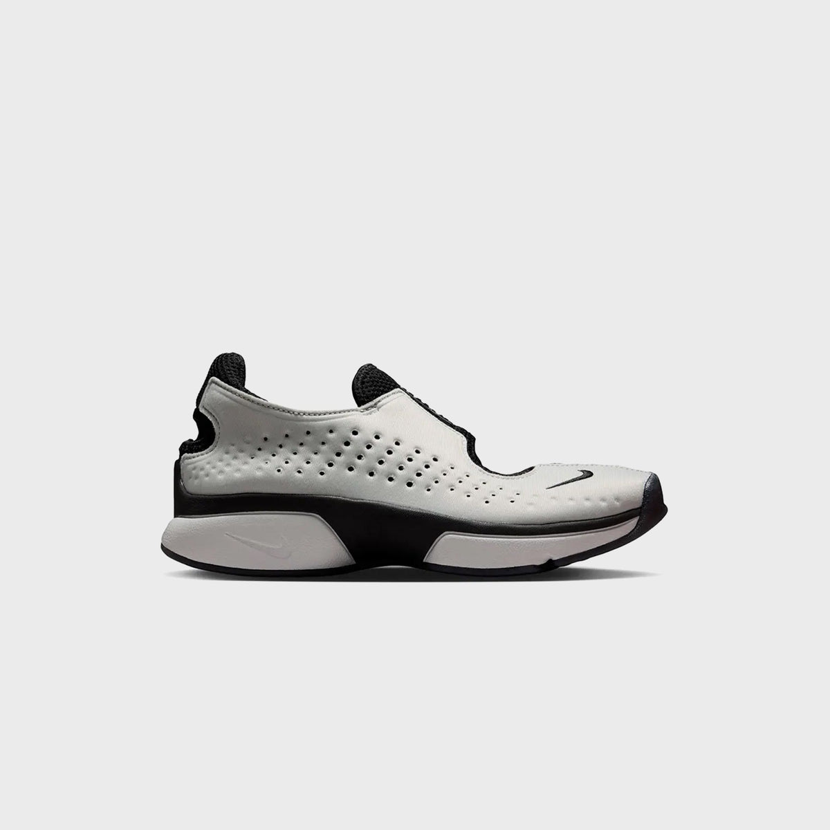 Nike Rift 2 split-toe sneaker in Black and Metallic Silver, lateral side view with perforated toe box