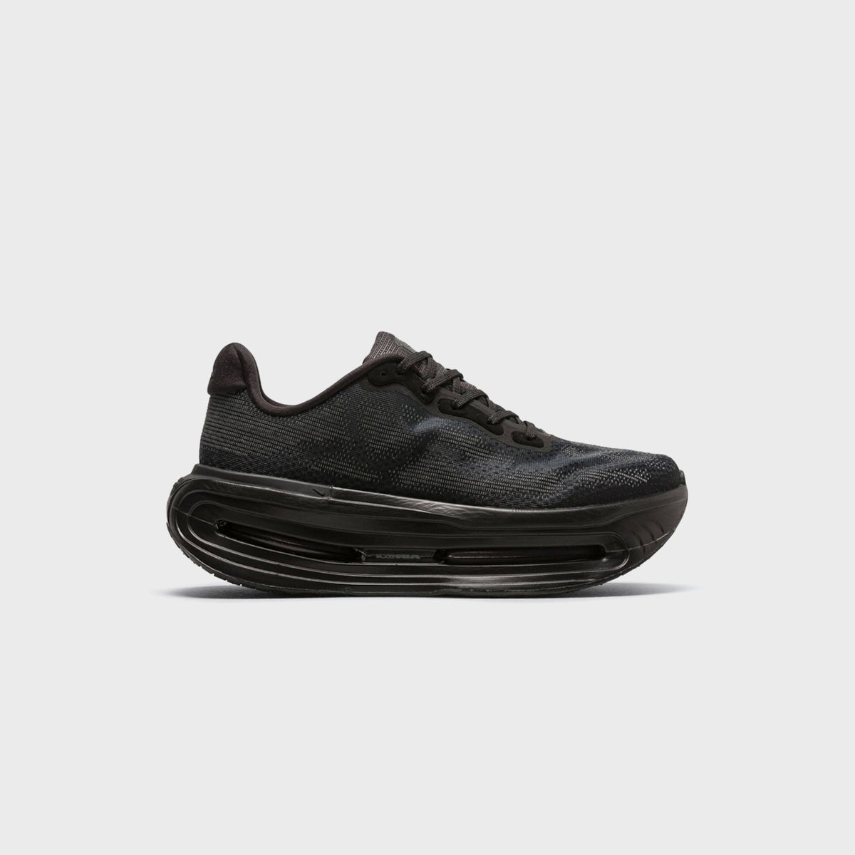 Nike Vomero Premium SP in Black / Iron Grey, side view showing knit upper and sculpted air-window midsole