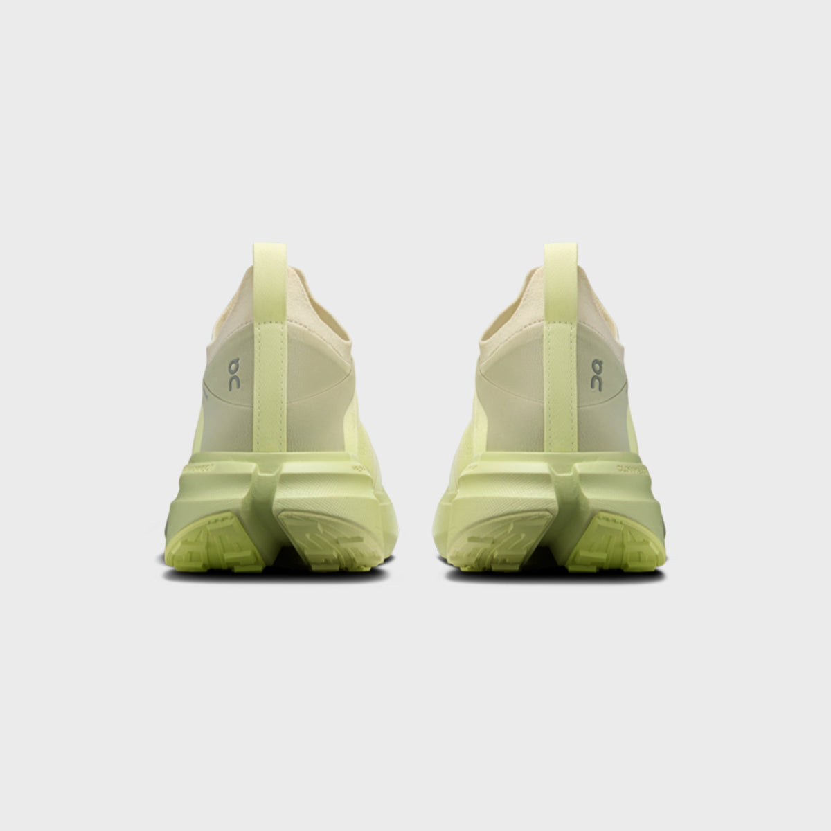 On x Post Archive Faction Cloudsoma sneaker in pale lime green, rear heel view of pair