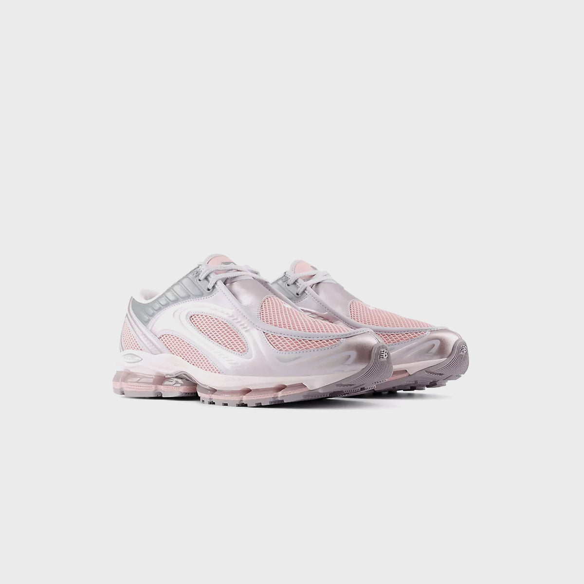 New Balance 1890A sneaker in Pink Granite / Pink Chalk, three-quarter view of pair with metallic panels and chunky sole