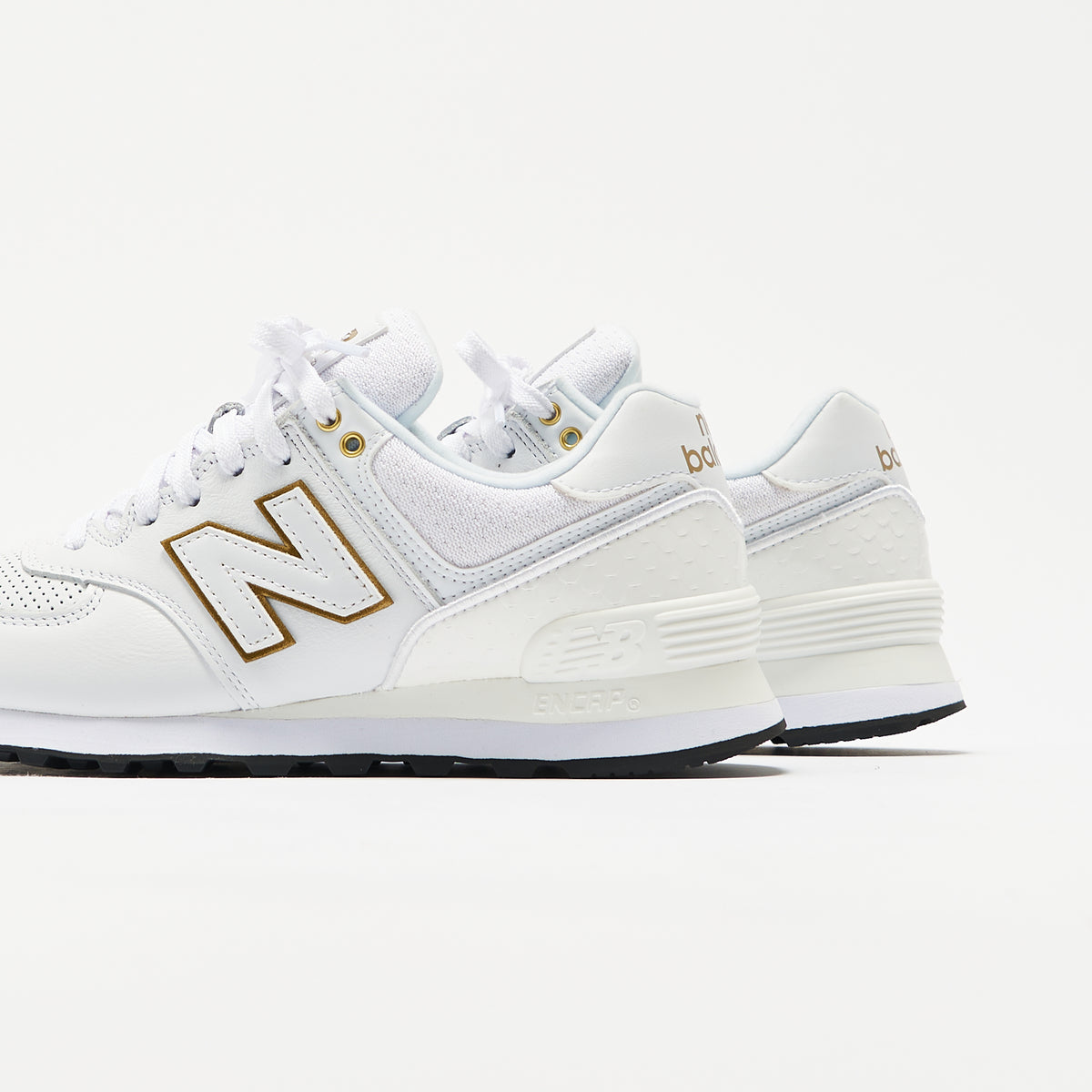 New Balance WMNS 574 - White / Metallic Gold